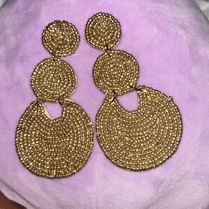 Gold tone beaded oversize earrings
